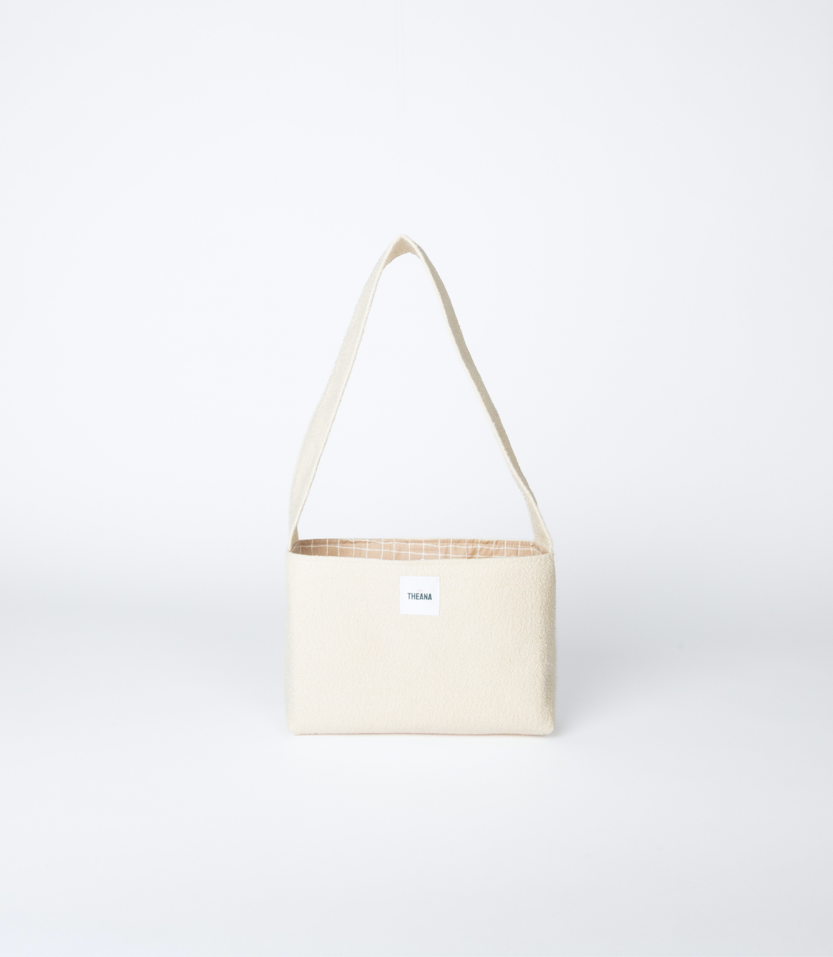 mini sac beige en tissu effet bouclette avec doublure à carreaux et bouton aimanté – marque THEANA