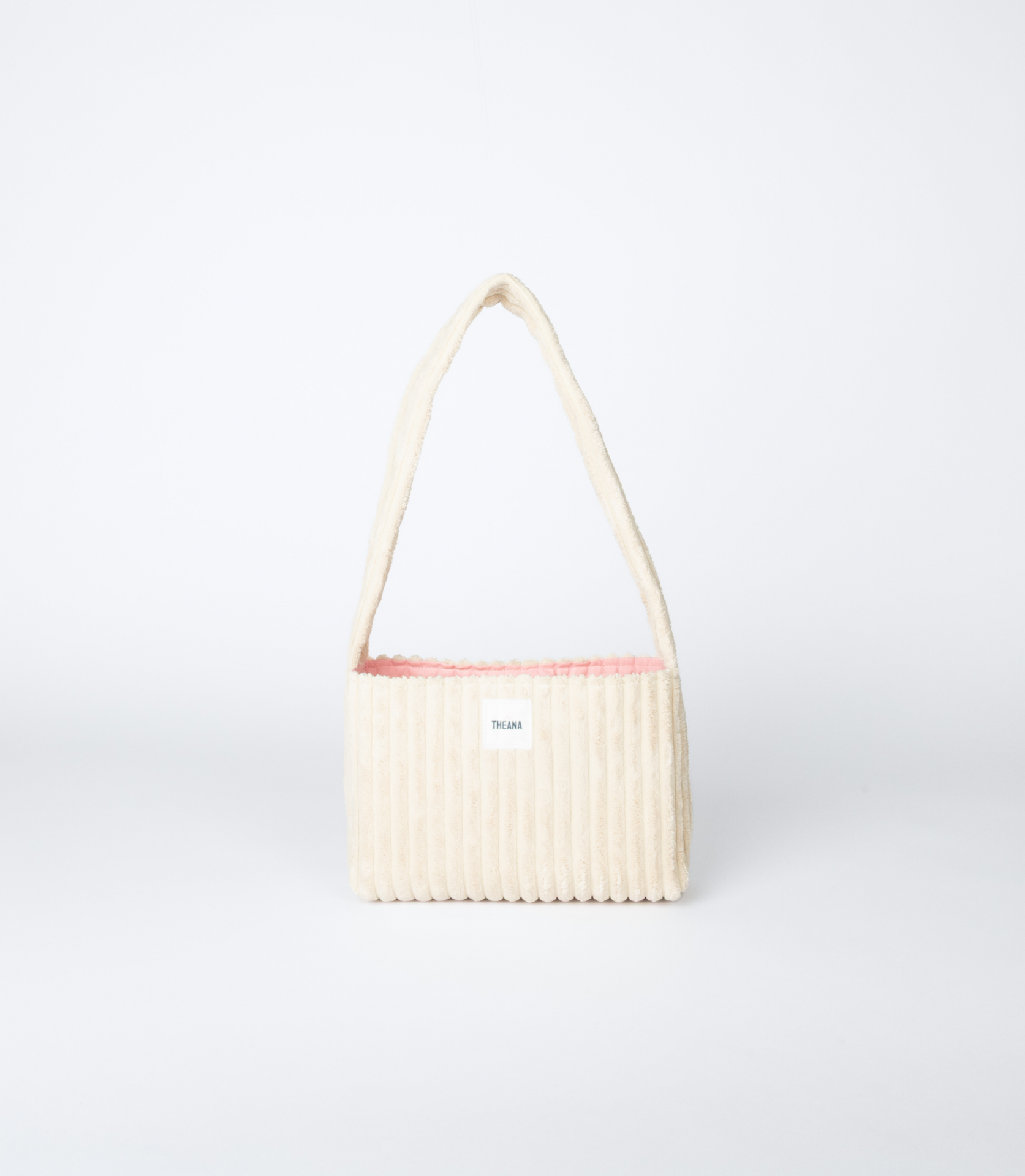 mini sac beige en velours côtelé avec doublure assortie et bouton aimanté – marque THEANA